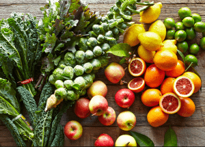 a group of fruits and vegetables on a wood surface Healthy Weight Loss Diets Sutton